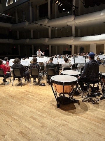 rehearsal in a concert hall